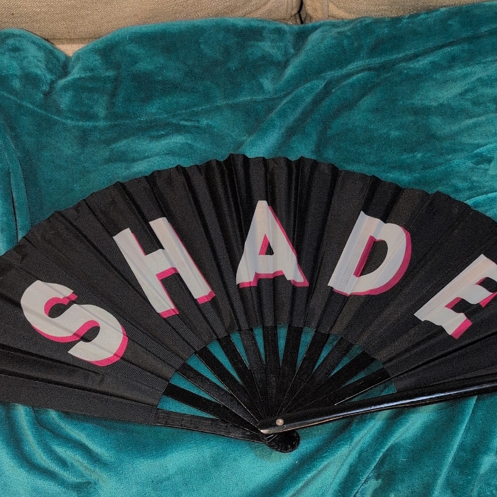 Black Folding Fan with The Word SHADE
